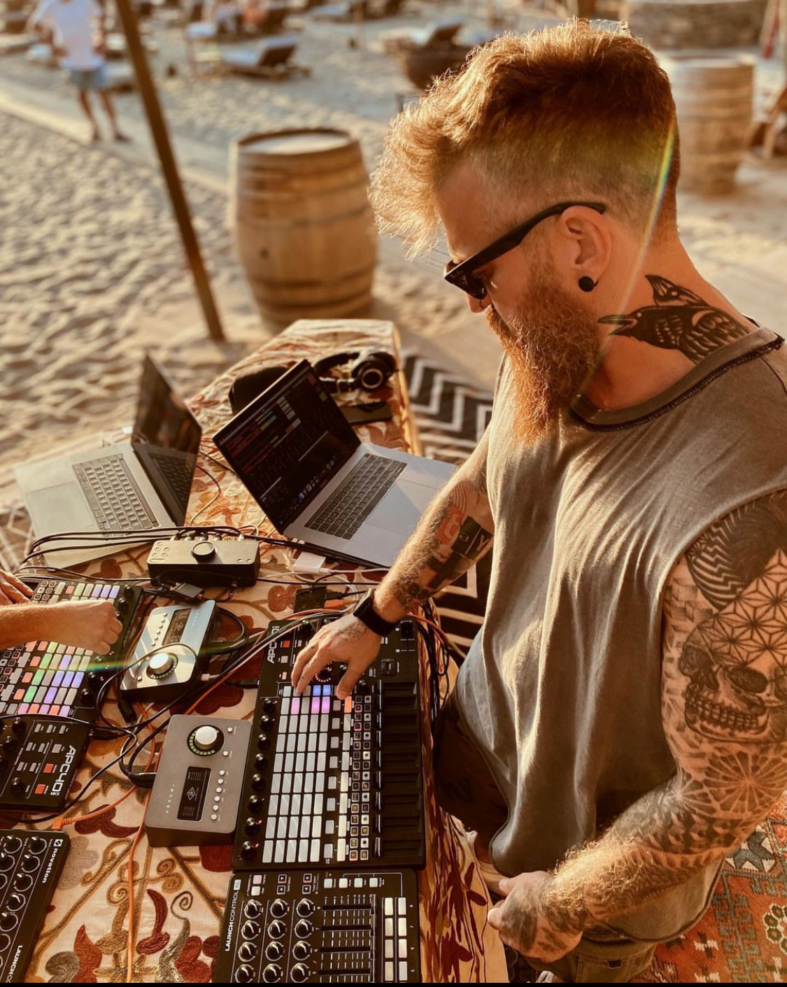 SW3NTON playing a live hardware set at golden hour